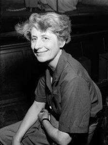 black and white photo of a slender middle aged lady, 1940s