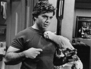 black and white image of  Baretta and his parrot