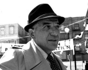 black and white photograph of a detective in an trilby style hat